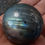 Thumbnail: Labradorite sphere, iridescent blue hues