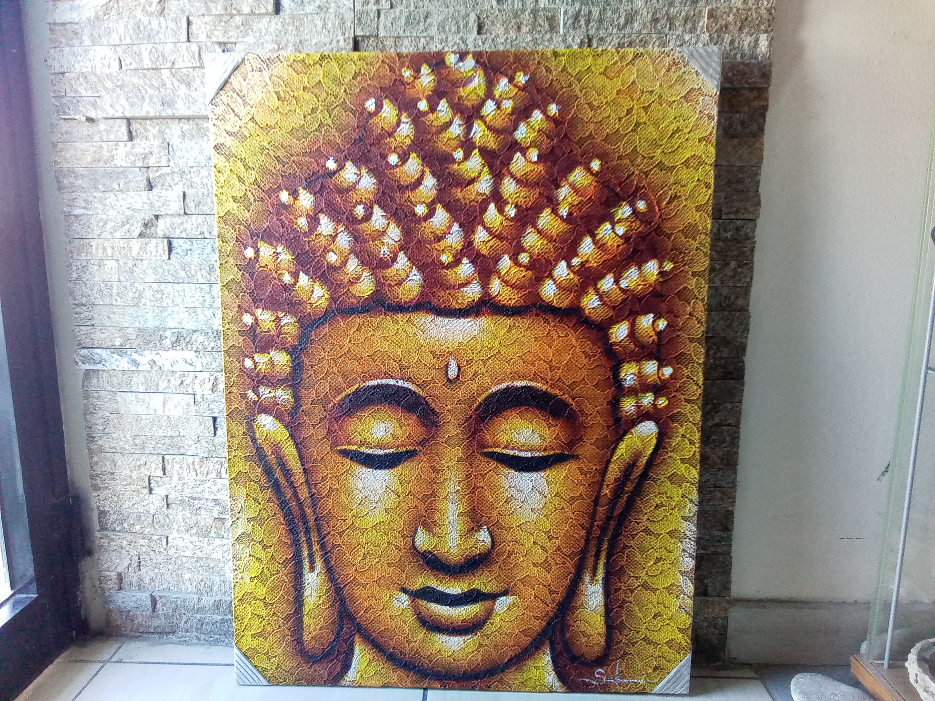 Serene Buddha painting, golden hues