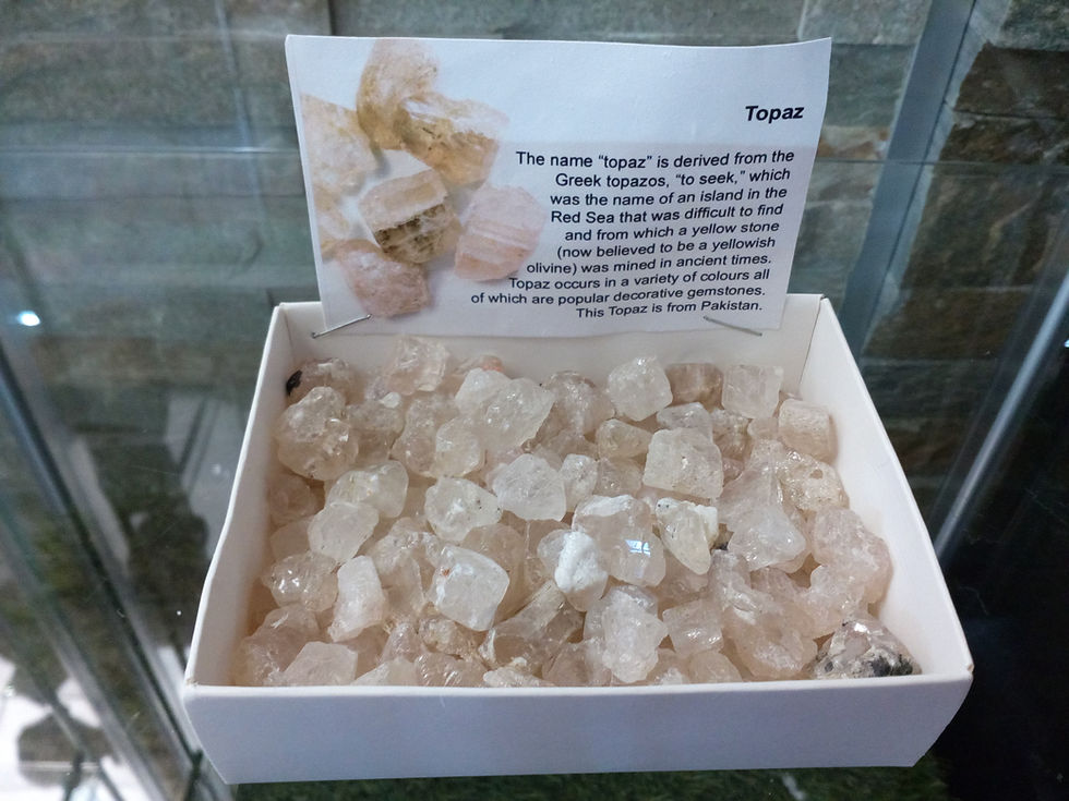 Thumbnail: Topaz crystals in box with info card