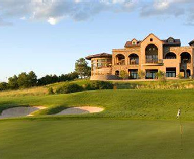 A conference center sits on the edge of a golf course