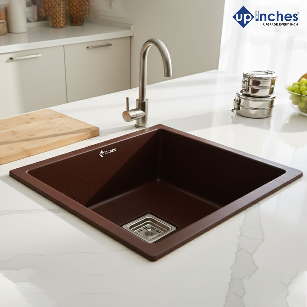 Brown quartz kitchen sink installed with steel faucet on grey countertop, earthy and elegant modern kitchen décor.