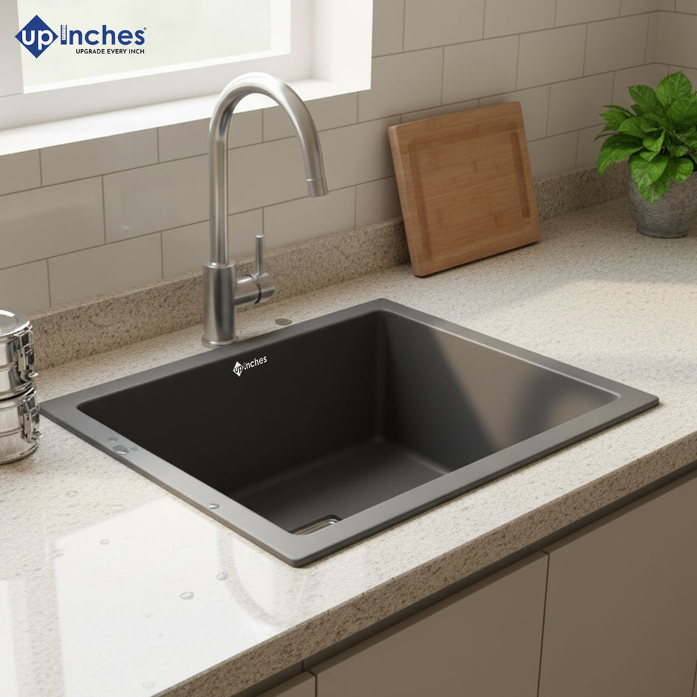 Grey quartz kitchen sink installed on countertop with steel faucet, stylish and versatile modern kitchen look.