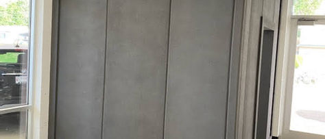 Our Cutting-edge Insulation Solutions Office divider in passive grey frames an office.