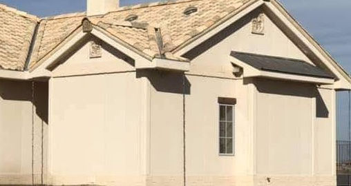 The exterior of this home features our Prefabricated Insulated Stucco Wall Panel in a light beige color. This panel not only enhances the aesthetic appeal of the home but also provides insulation, contributing to its energy efficiency and modern appearance.