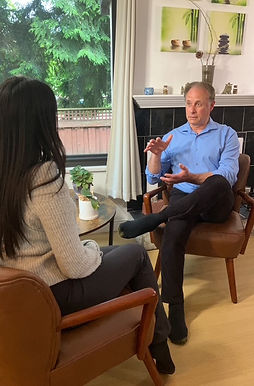 Klaus Klein talking to a client