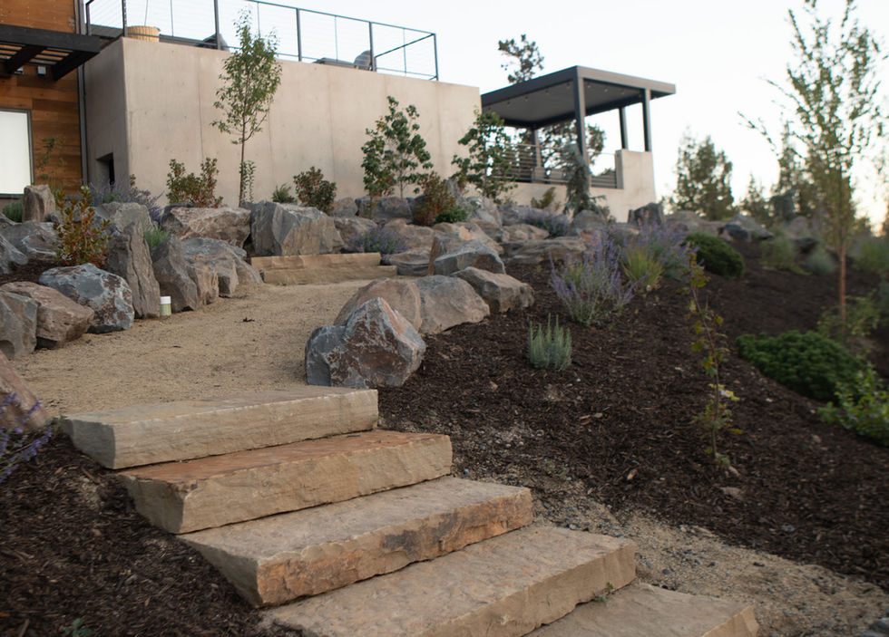 natural stone steps in a residential landscape design in Bend by Bend Landscape