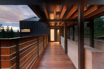 Sleek modern architecture using a mix of material including CMU concrete masonry, wood and metal.