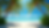 Eye-level view of a tropical beach with palm trees and clear blue water