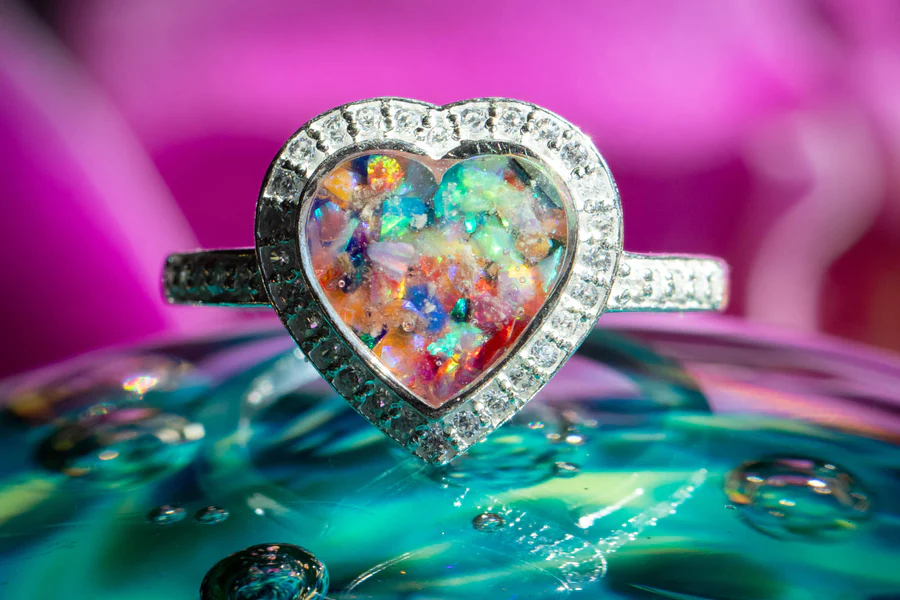 iridescent memorial heart ring with rainbow stone