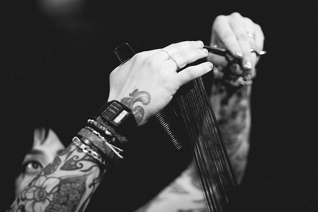 Cleo cutting hair at ALIBI Collective in Raleigh
