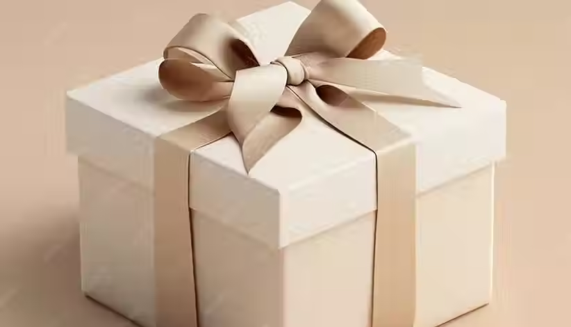 gift-white-box-with-beige-ribbon-beige-background-gift-holiday_629213-1580.avif
