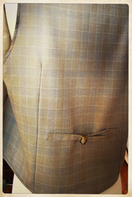 Gilet en tartan de laine doublé en pongé de soie.