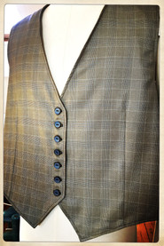 Gilet en tartan de laine doublé en pongé de soie.