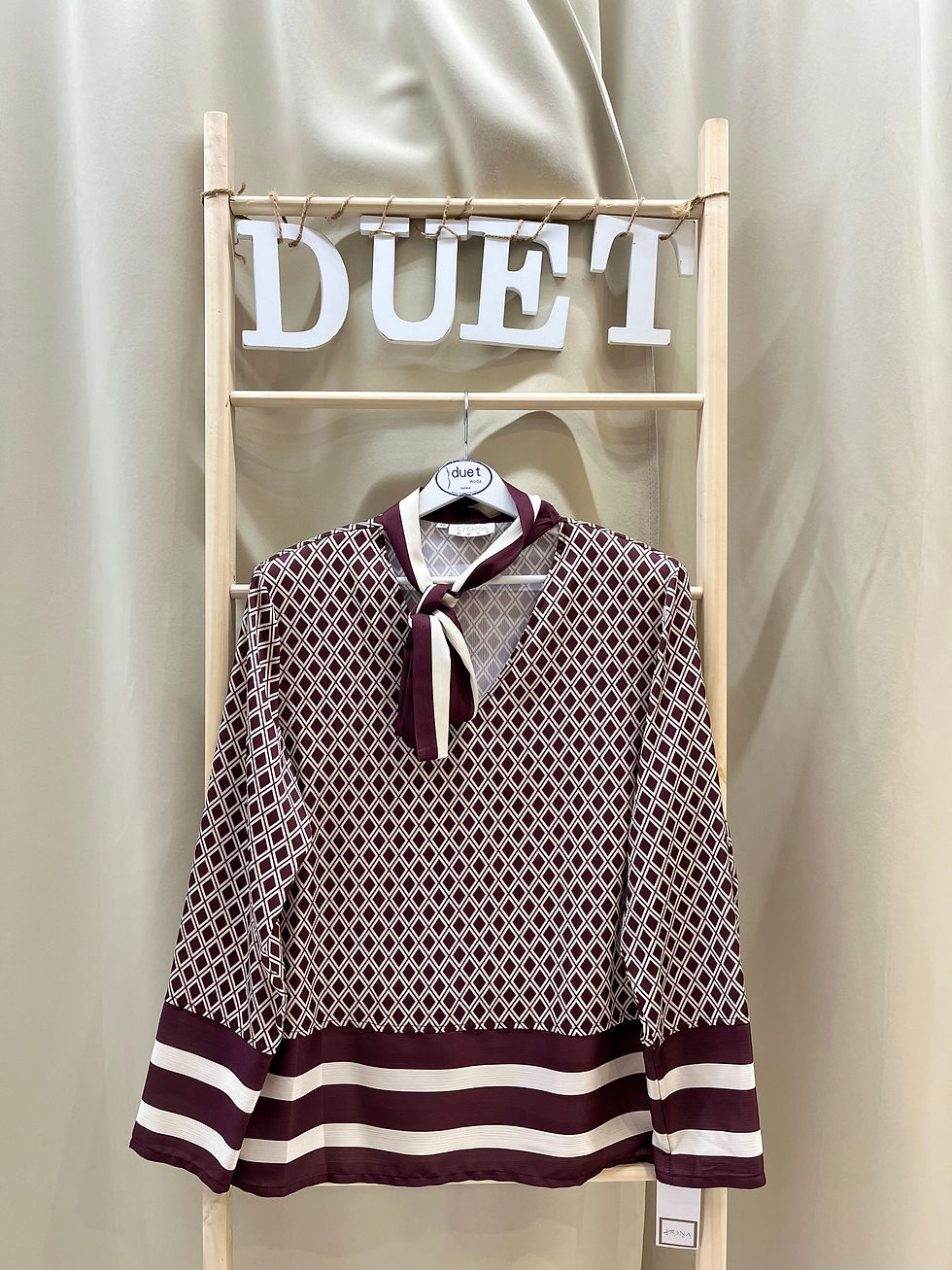 Miniatura: Blusa estampada granate Dona 