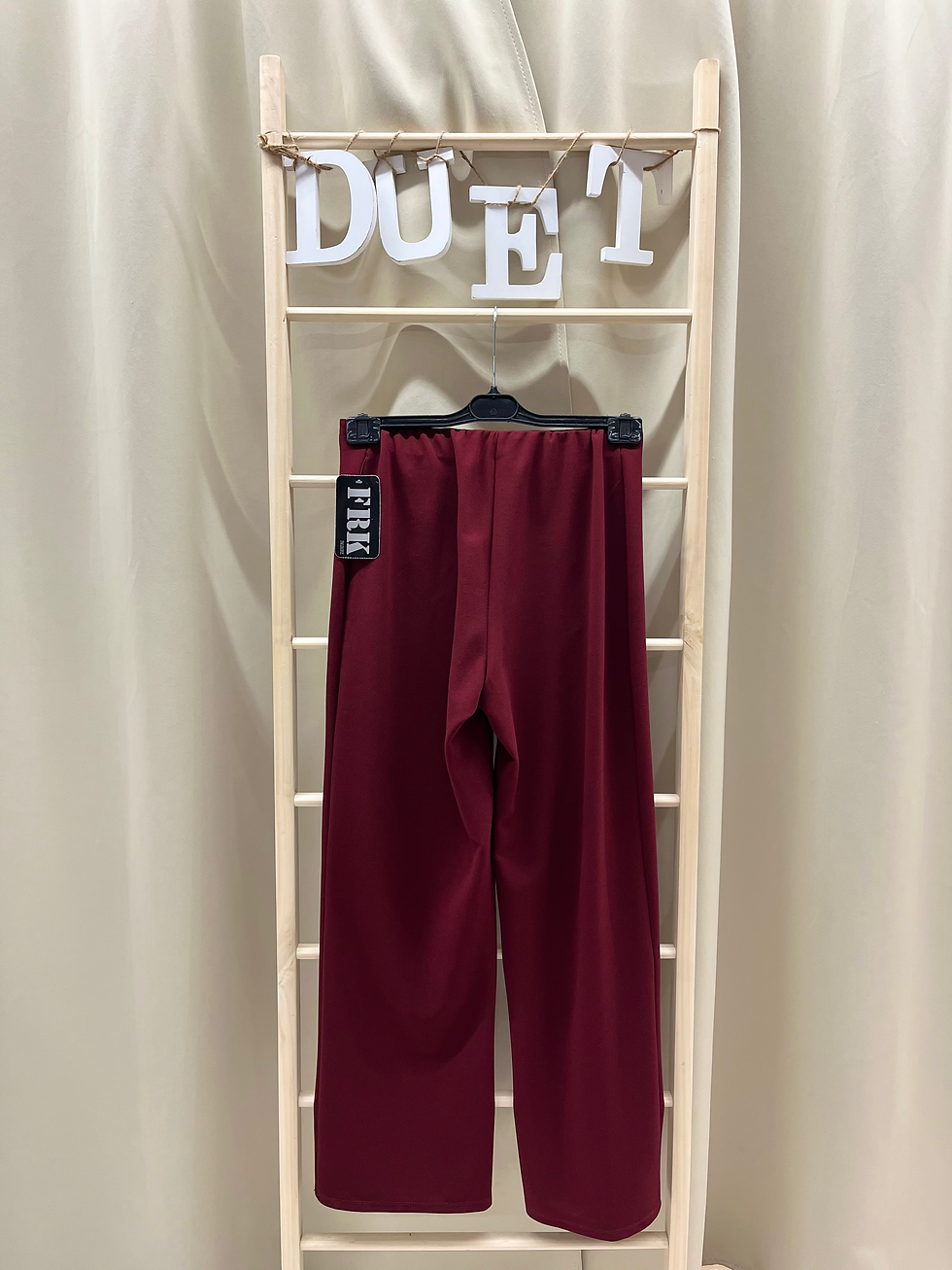 Miniatura: Pantalón burdeos botones