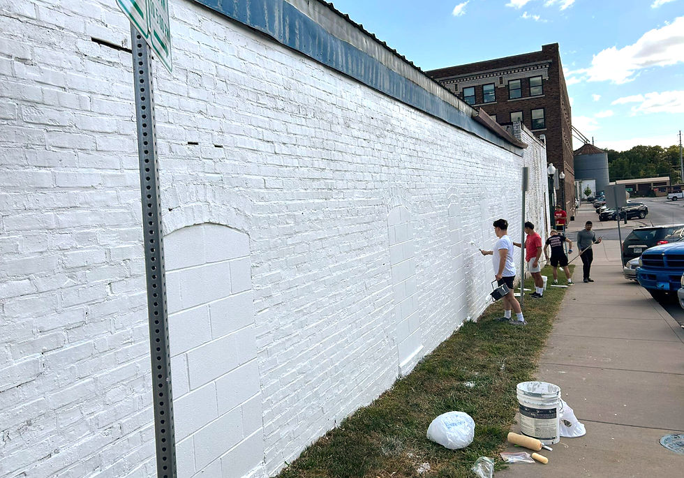 Thank you to our Benedictine College Wrestling Team volunteers who nearly finished priming the mural wall earlier this week!
