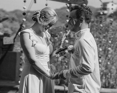Couple holding hands during an intimate outdoor wedding ceremony in Sayulita