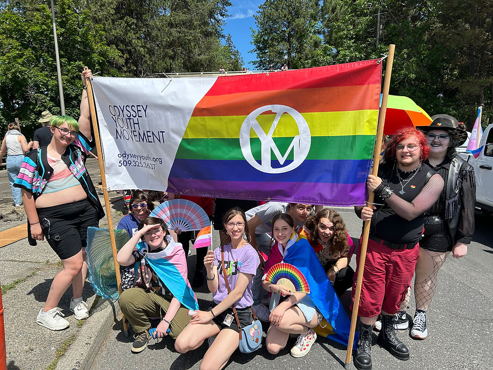 Odyssey youth pose for a photo at the Spokane Pride Parade.