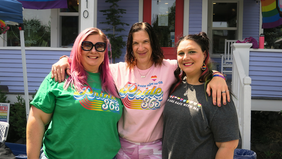 Vendors pose for a photo at Pride In Perry 2024.
