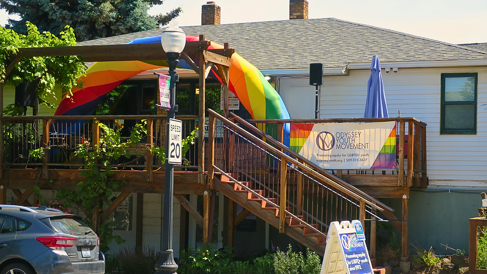 Odyssey hosts a rainbow arch on their balcony during Pride In Perry 2024.