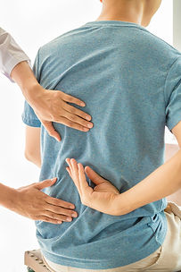close-up-physiotherapist-working-with-patient-clinic.jpg