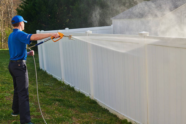 summit outdoor services offering fence cleaning services