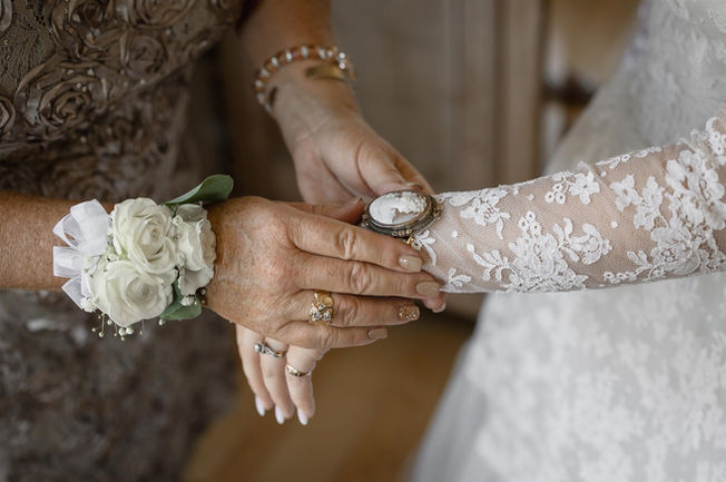 Bride wearing vintage wedding dress and matching vintage sleeves at CaliPaso Winery and Estate