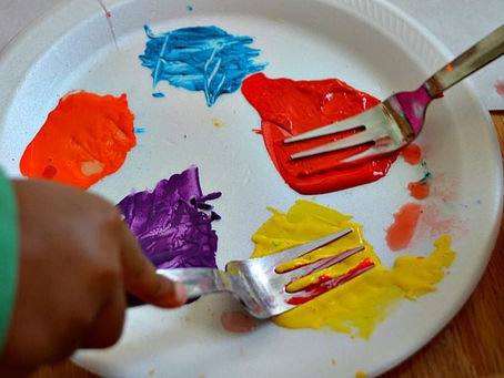 Children’s printing artworks with kitchen utensils