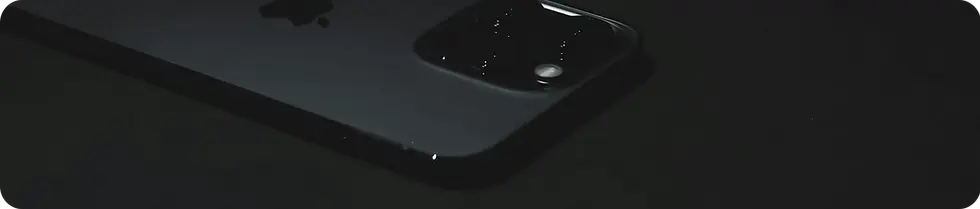 A sleek black smartphone on a dark background, representing mobile-optimized digital marke