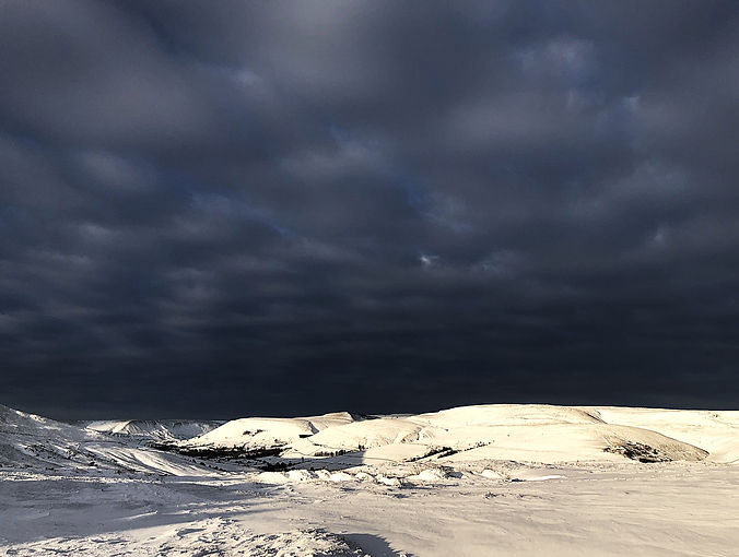 Bright snow dark cloud.JPG
