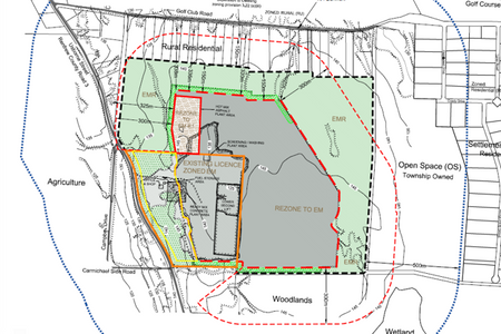 Planning and zoning map illustrating the proposed expansion of the Braeside Quarry. The diagram shows the existing licensed quarry area in the southwest portion of the site and a large proposed extraction area to the east labelled “Rezone to EM.” Coloured outlines identify proposed licence boundaries, zoning changes, and plant locations, including a hot mix asphalt plant and screening/crushing area. Surrounding land uses are labelled as woodlands, agriculture, rural residential, open space, and wetlands, with nearby roads including Golf Club Road and Carmichael Side Road shown for context. The figure represents the planning framework supporting the quarry expansion and associated operational facilities. Braeside, ON.