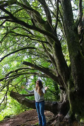 Jana-poetry in the woods.webp