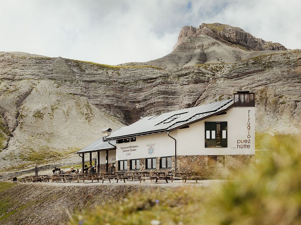 Rifugio Puez in the Dolomites, embedded in rocky surroundings with amazing views
