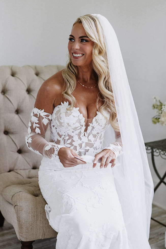Bride in veil at golden hour for a sunrise Hawaii wedding