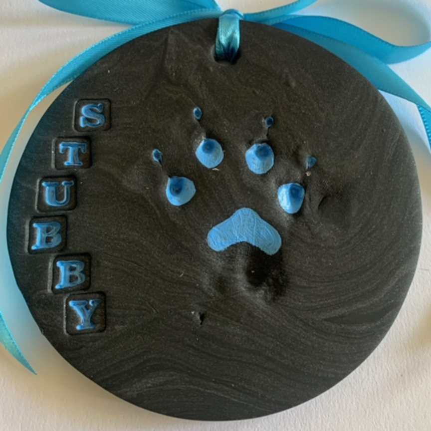 Swirled Clay Pawprint in Custom Black Coat Color with Blue Paint