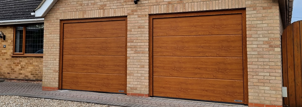 2 Hormann Golden Oak sectional garage doors