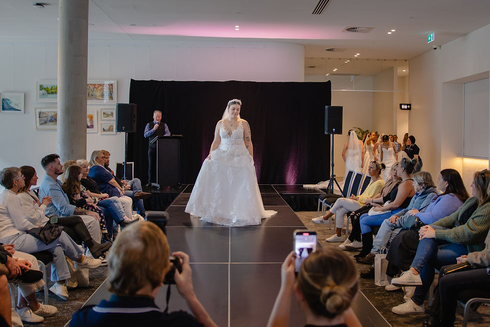 Bridal runway show with guests watching