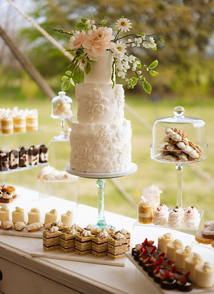wedding cake and dessert table