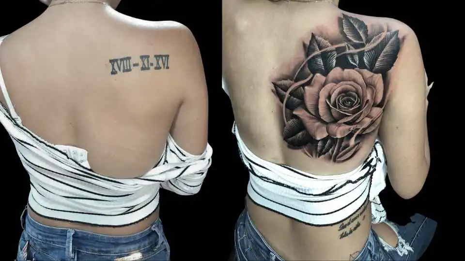 Cover-Up-Tattoo einer großen Rose über einem alten Schriftzug auf dem Rücken, gestochen im 6ink9 Tattoo Studio in Köln | Cover-up tattoo of a large rose over an old script on the back, Cologne