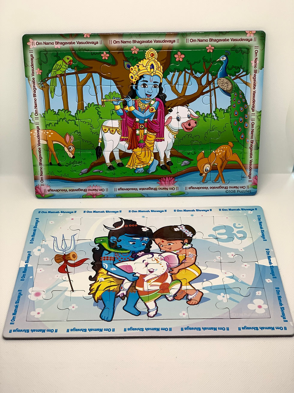 Thumbnail: 2 24 piece tray jigsaw puzzles of hindu gods from 108 puzzles