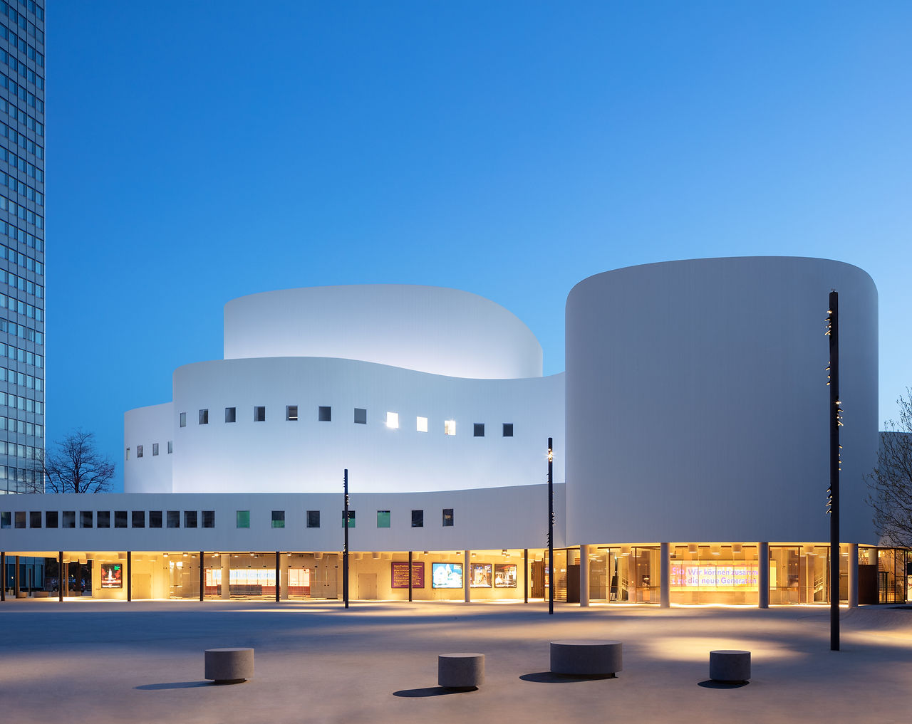 Exterior view of Schauspielhaus designed by Christoph Ingenhoven, striking facade and contemporary a
