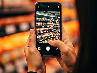 "User taking a photo of a product in a local store to upload on LOJER app
