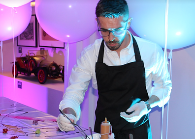 Professional event setup with elegant catering displays by Kai Catering