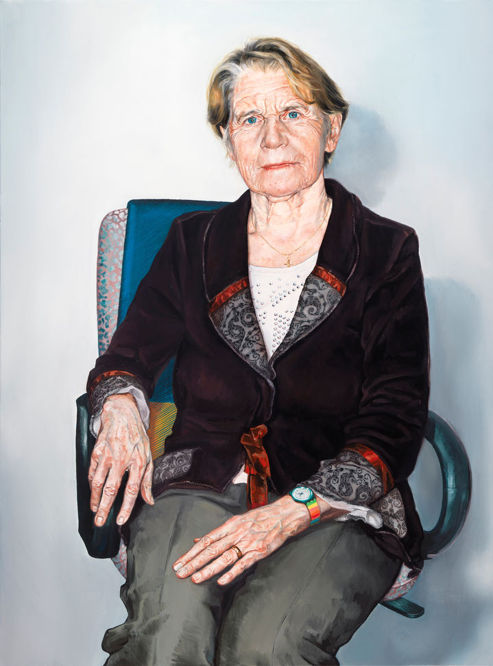 Woman sitting in desk chair