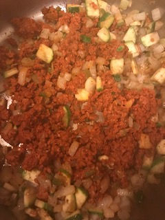 Sauté the veggies and chorizo