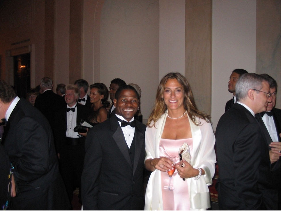 The author standing next to Leonard Flowers, Global Ambassador, Special Olympics. Former Miss America Vanessa Williams in the background