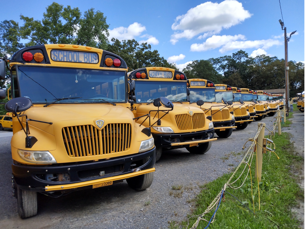 There's no shortage of school buses, but they don't drive themselves