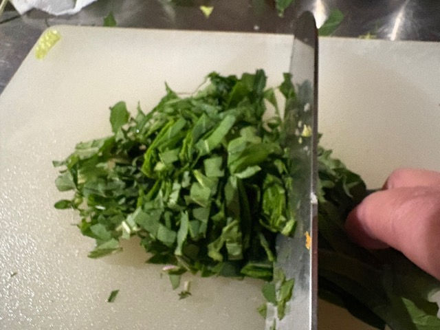 Finely shred arugula.