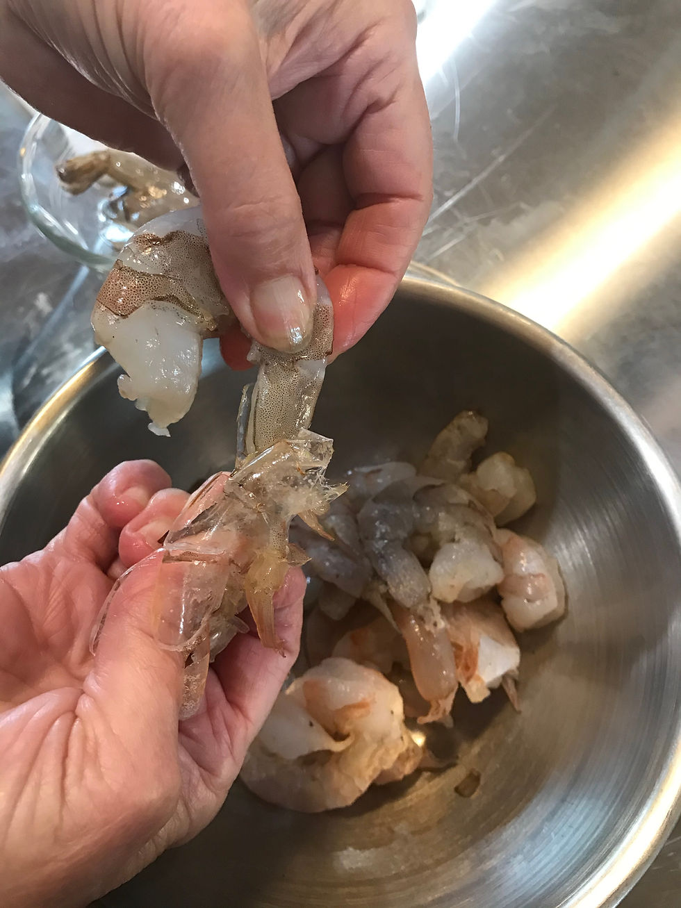 Adding flour to egg, buttermilk, and oil