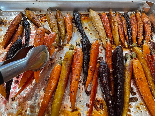 Turn carrots over using tongs halfway through the cooking process.